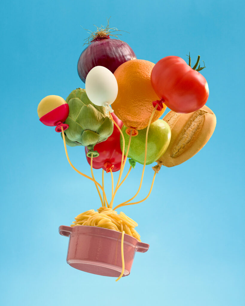 Paloma's art. Food is arranged to look like a hot air balloon in a hyper real way.