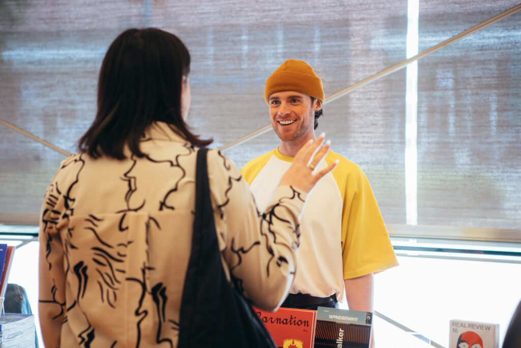 Photo of two people talking